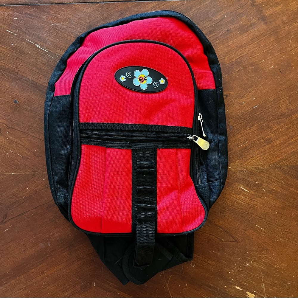 Daisy Girl Scout NWOT, Red, Multi Pocket Sling Bag With Flower Design. NWOT